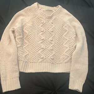 Beautiful cream colored sweater in size small. Soft, comfortable, cute pattern.